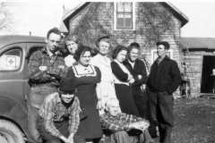 Arnold Family at Fred Balitz farm, Alvin, Tracie, Charlotte, Mary, Doris, Allen, Daniel; front, Laban, Fred, circa 1941.