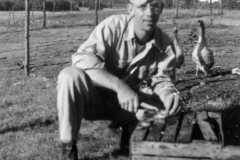 1943-07-01-PFC-ArnoldAE1917-cleaning-fish-2