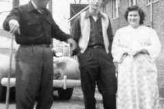 Doris Jane Arnold and firiends holding funeral for a goldfish, perhaps at Owosso Bible College, circa 1950.