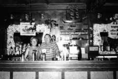 1957-04-01-MooreRE1910-at-Bar2
