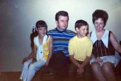 Bill, Sally, Kandy, and Randy. We are so proud of this picture, the best thing Alvin and I [Charlotte] ever did was to bring Sally into our home. Bill is as nice as Sally. Alvin and Bill are closer than most father and sons, and Sally is told all the time she looks and acts like me. Too bad. May 1970.
