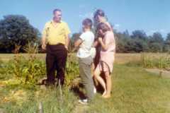 Laban and Alvin Arnold with Gloria, Michael, and Teresa in the garden at Bexley, Summer 1970.