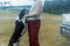Gloria Arnold with Mike the dog, Arnold homestead, July 1970.