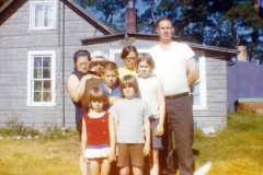 Doris and Laban Arnold with Joyce, Daniel, Gloria, Michael, Valerie, and Teresa, at the old Arnold Homestead, July 1970.