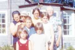 Doris and Tracie Arnold with Joyce, Daniel, Gloria, Michael, Valerie, and Teresa, at the old Arnold Homestead, July 1970.