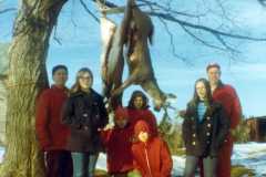 Daniel Arnold, Joyce's friend Chris, Dan, Mike, Gloria, Joyce and Laban Arnold. Deer season, three deer and two fox taken, Arnold homestead, November 1970.