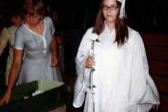Joyce receiving class flower on graduation night, LC Walker Arena, June 1971.