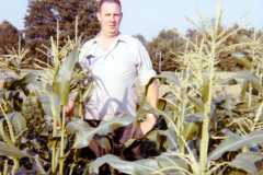Laban Arnold in the nearly six foot high corn, Bexley garden, 1971.