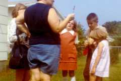 Doris Arnold with Gloria, Valerie, Mike, and Teresa, getting ready to release King Wee Wee, the Monarch we "raised", summer 1971.