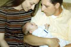Carol and Bob with Scott Suderno, 3 weeks old, October 1971.