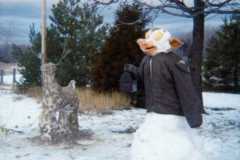 Snowbuck, and snowman made with butchered pig parts, deere season, November 1971.