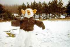 Snowman made with butchered pig parts, deere season, November 1971.
