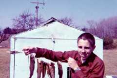 Dan Arnold holding trout, 1972.