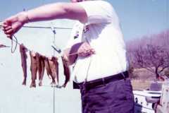 Laban Arnold holding trout, 1972.