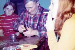 Gloria, Daniel, Eleanor Arnold, deer season at the Arnold homestead. November 1972.