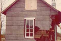 Demolition of Honor home built by Daniel Webster Arnold, fifty-five plus years later. Looks like all additions are removed and what is left here is the original house. Compare to pictures from 1920's and 1930's. Taken June 1975.