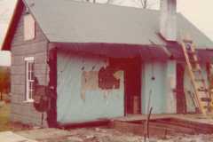 Demolition of Honor home built by Daniel Webster Arnold, fifty-five plus years later. Looks like all additions are removed and what is left here is the original house. Compare to pictures from 1920's and 1930's. Taken June 1975.