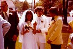 Receiving line at Dan and Peggy Arnold's wedding ceremony, August 13, 1977.