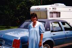 Peggy Arnold in front of 1982 Oldsmobile Delta 88.