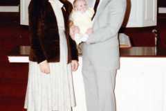 Dan and Peggy dedicating baby David Daniel Arnold, October 1983.