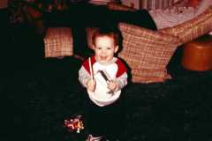David Arnold with dad looking on, at Grandma's in Battle Creek, circa 1985.