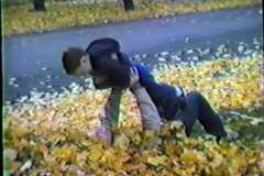 Dave and Dan Arnold playing the leaves, 904 Fourth Street, October 1986.