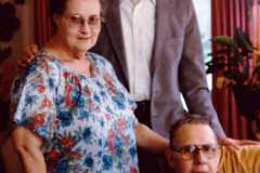 Doris and Laban Arnold with Doris's Pastor, December 1986.